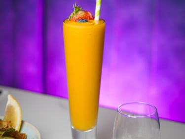 Fresh mango juice drink commercial beverage photography