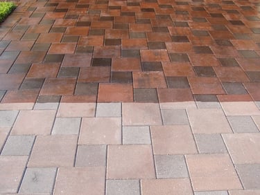 A 50/50 sealed paver area displaying the difference between seal and unsealed pavers