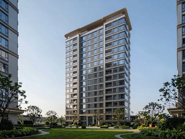 Sleek modern exterior of The Belaire residential towers, framed by manicured sky gardens and clear blue horizon.