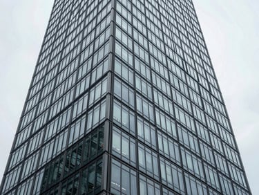 Elegant architectural perspective of M3M St Andrews high-rise tower, highlighting its modern minimalist glass facade.