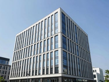 Professional architectural photography of a modern commercial office building exterior, high-end real estate, crisp midday sun