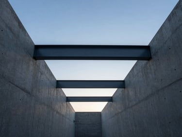 Wide-angle architectural perspective of clean concrete lines and steel beams reaching toward a clear morning sky, minimalist corporate design