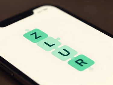 Close-up of a high-fidelity vector UI showing a word-building puzzle on a soft cream background.