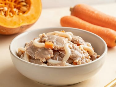 Fresh natural ingredients like pumpkin, carrots, and clean meat in a ceramic bowl, warm editorial lighting