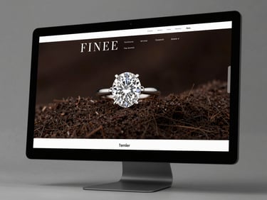 Full-screen render of a fine jewelry brand website on a monitor, minimalist dark product page with diamond ring hero image, even studio lighting, sharp UI details visible