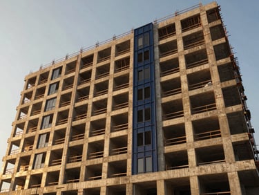 Wide-angle shot of a modern hotel facade under construction, exposed concrete and clean steel framing against a warm morning sky, sharp focus, 35mm
