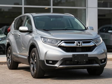 Wide three-quarter front shot of a silver 2020 Honda CR-V on a neutral dealership forecourt, bright daylight, full vehicle visible