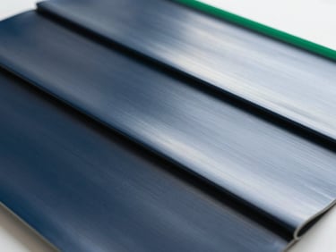 Macro shot of high-quality PVDF membrane fabric texture, showing its smooth, reflective surface, bright studio lighting, technical product photography.