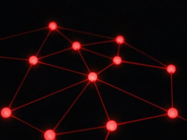 Abstract technological system of connected glowing crimson nodes on a stark black background, 35mm film grain, high contrast