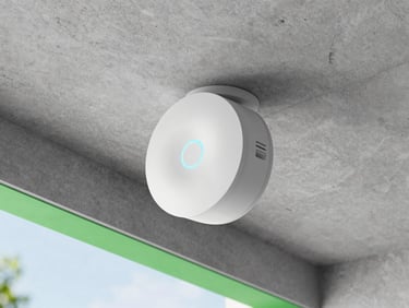 Sleek round white WiFi access point mounted on a raw concrete ceiling, status ring glowing soft blue, clean modern architectural lines