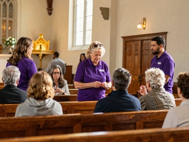A wide editorial photograph of a warm, sunlit church lobby in Upstate South Carolina, families greeting each other, natural golden hour light, shallow depth of field