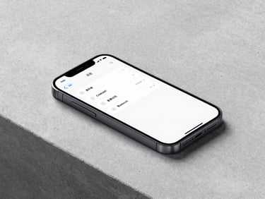 A high-end minimalist smartphone lying on a concrete desk, displaying a clean mobile application interface, sharp focus, 35mm lens