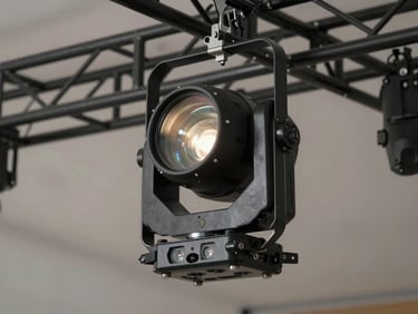 Close-up of a professional moving head fixture mid-pan on a black truss, beam visible in haze, studio-lit for precision detail, technical readiness evident