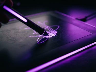 Macro close-up of a sleek digital drawing tablet with a glowing violet stylus, high-contrast obsidian tones, dramatic neon purple backlighting, 35mm