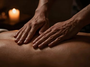 Macro shot of hands performing precise massage strokes on a shoulder, moody low-key lighting, rich bronze tones