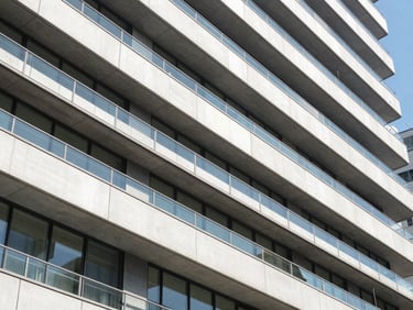 Crisp editorial travel photography of modern Tokyo architectural details, clean lines, bright natural daylight