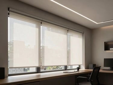 Modern minimalist home office during daytime, automated roller shades partially open letting soft natural light in, cool white linear LED accents in the ceiling