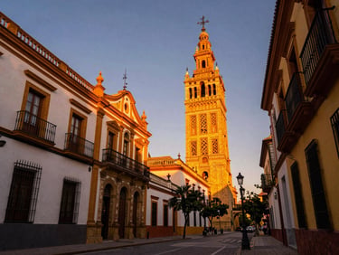 Vibrant street scene in Seville at sunset, dramatic low-angle architectural view, rich saturated tones