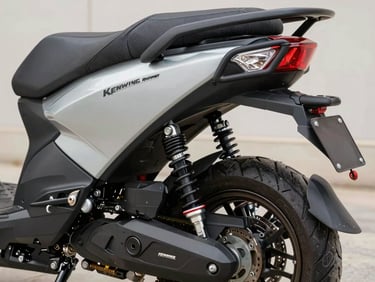 Close-up of the heavy-duty rear suspension and cargo rack of the Kenwing Runner scooter, rugged utility design.
