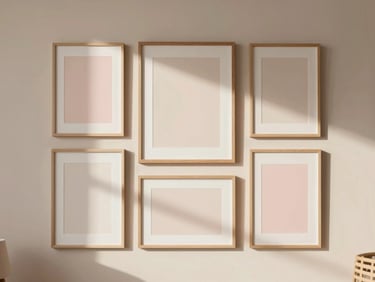 Straight-on shot of a modern Scandinavian living room gallery wall with multiple empty frames, warm morning light, beige and linen tones, 35mm