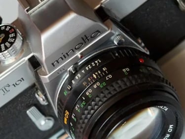 Minolta SRT101 being repaired