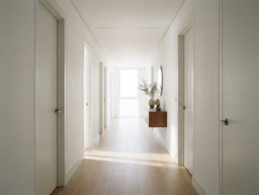 Crisp architectural elevation of a narrow apartment hallway, bright directional daylight, sharp clean shadows, minimalist interior, 35mm