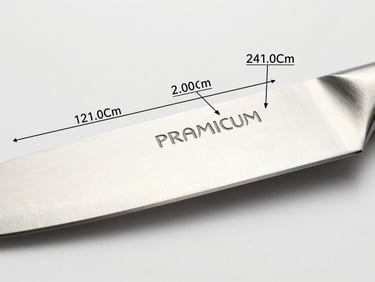 Macro close-up of a premium kitchen knife on a clean white surface, highlighting sharp steel texture and clear graphic callouts of product dimensions