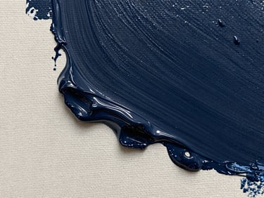 A close-up documentation of thick, dark navy oil paint textures on a canvas, showing canvas weave and flat gallery lighting.