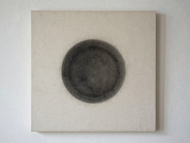 A straight-on, clean fine art photograph of a mixed media artwork on raw linen, featuring a single dark charcoal circle casting a subtle shadow.