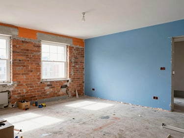 Interior view of a high-end residential renovation, showing exposed brick and new drywall, organized tools, bright natural light.