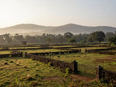Wide-angle landscape of a sun-drenched gated farm plot in Maval, clearly marked boundaries with stone pillars, misty hills in the background, morning light.