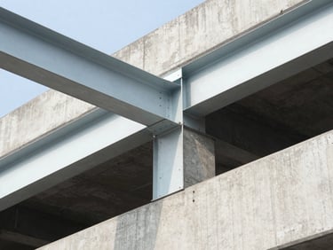 Close-up of industrial concrete and exposed steel structures, sharp focus, bright daylight