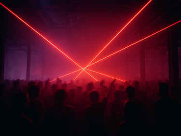 Low-key atmospheric shot of an industrial warehouse dance floor at night, sharp red laser beams, hazy air
