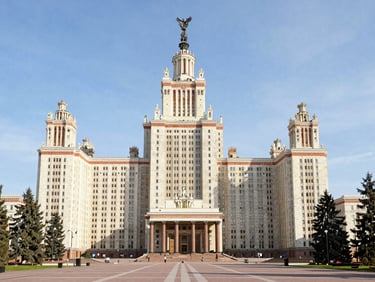 Classic historic university facade in Russia, bright daylight, clean academic environment.