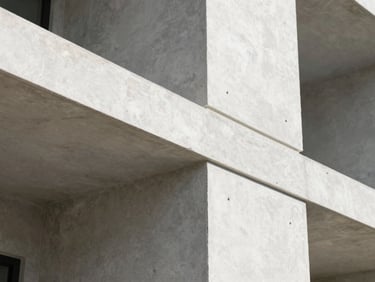 architectural photography, macro close-up of a high-quality architectural concrete joint, clean lines, sharp shadows, bright natural daylight, 35mm