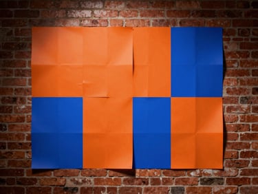 High-contrast campaign mockup of editorial posters pasted on a brick wall, vibrant orange and electric blue accents, dramatic studio flash.