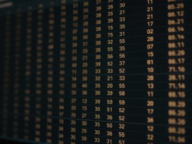 Abstract visualization of data flowing across a dark screen, with subtle glowing lines and numerical readouts, low-key lighting, cinematic close-up