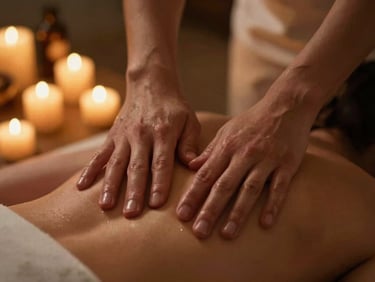 Close-up of therapeutic massage with warm oils, soft golden candlelight, shallow depth of field, 35mm