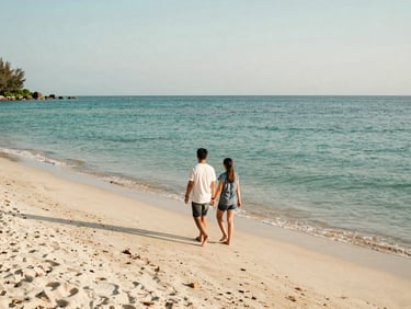 A couple walking hand-in-hand on a pristine white sand beach in Phu Quoc, Vietnam, clear turquoise water, soft morning light, warm editorial travel photography.