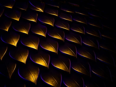 Dynamic isometric view of abstract golden dragon scales shimmering under high-contrast dark-room lighting, deep obsidian black shadows, purple neon accents, sharp focus