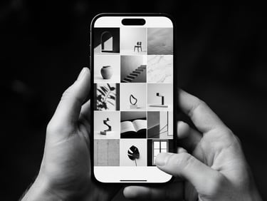 Close-up of a high-end smartphone displaying a perfectly curated minimalist Instagram feed, sharp studio lighting, high-contrast black and white, crisp focus
