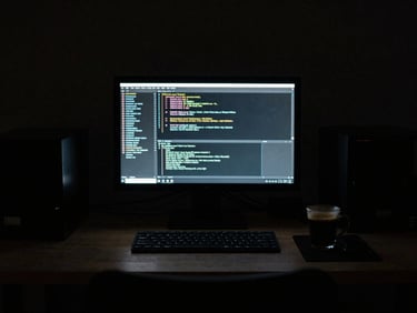 A solitary developer workspace at 3 AM, illuminated only by a glowing monitor showing dense terminal lines, a single cup of black coffee, high-contrast chiaroscuro, 35mm film grain