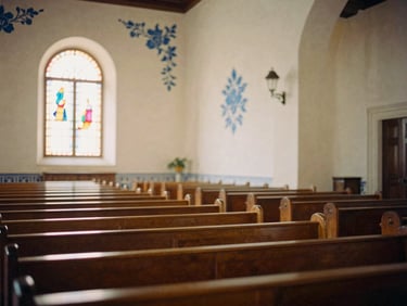 Grand interior of Mission Dolores Basilica, elegant architecture, empty pews, soft light from stained glass, delicate hand-painted blue watercolor floral accents.