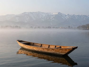 A single wooden shikara boat floating on Dal Lake in Srinagar under heavy morning mist, snow-capped mountains faint in background