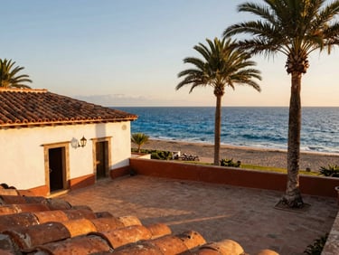 Traditional Mexican hacienda patio with terracotta tiles, overlooking the blue sea, warm sunset light, palm trees