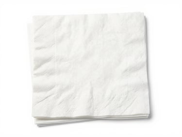 Bright high-key studio shot of white paper napkins and disposable cutlery, clean white backdrop