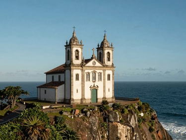Beautiful daylight shot of the iconic Church of Nossa Senhora de Nazareth perched on the cliffside in Saquarema, overlooking the blue Atlantic ocean.