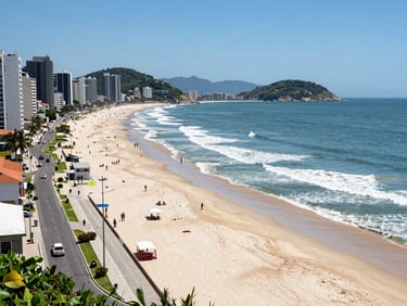 Bright coastal view of Cavaleiros beach in Macaé, showing the modern beachfront avenue and ocean waves under natural daylight.
