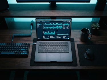 Overhead desk setup with a high-end laptop showing server speed metrics, cool blue and teal ambient lighting, clean tech photography, 35mm