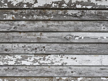 Before: weathered, graying cedar siding with peeling white paint and dark mildew spots, flat direct lighting.